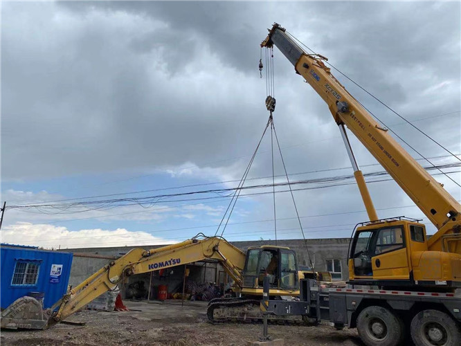 金门县25吨吊车的工作半径是多少？